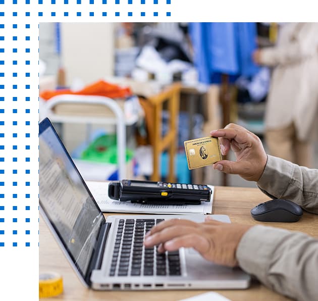 Person on computer using Tap to Pay